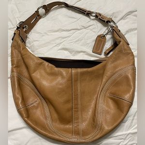 Coach crescent hobo handbag beige/Carmel leather adjustable strap.
